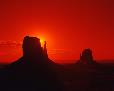 Sunrise at “The Mittens” in Monument Valley.